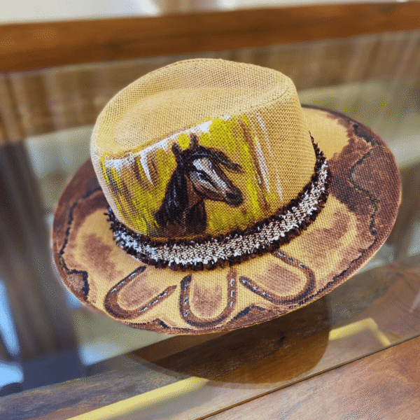 Side view of equestrian art Panama hat – rustic boho style