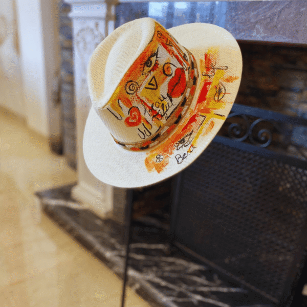 Side view of colorful pop art design on Panama hat